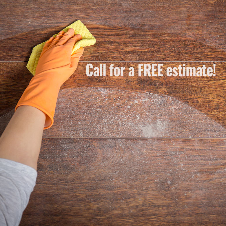 Wiping away dust with "Call for Free estimate" written out. 